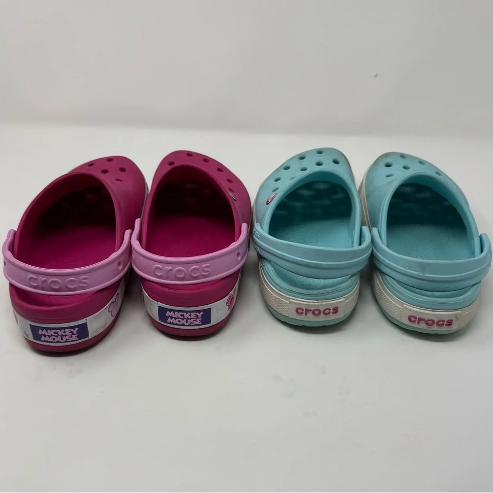 Crocs Bundle- Disney Pink size 3, Blue Size 2, worn a few times.